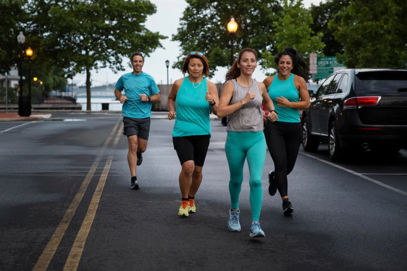 full-shot-people-running-together-outdoors_23-2149033474